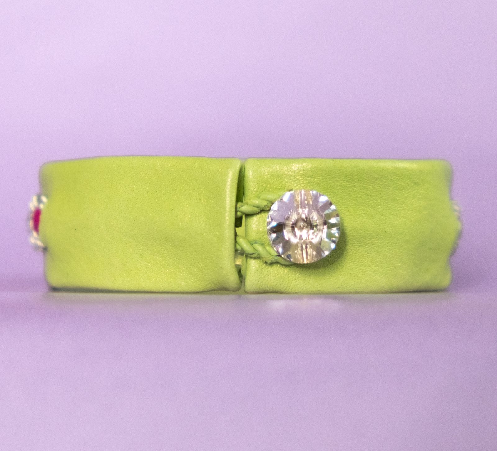 CAMILLA - Light green tin thread bracelet with magenta / cerise / pink coloured details and genuine Swarovski crystal button
