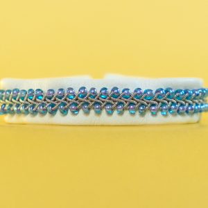 GLADYS - Off-white tin thread bracelet with silver-lined light blue Miyuki seed beads and genuine Swarovski crystal button