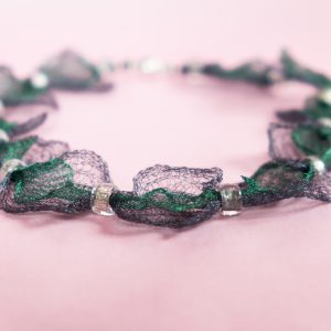 Pre-knitted craft wire necklace.